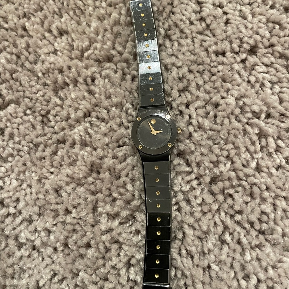 Movado Black and Gold women’s Watch